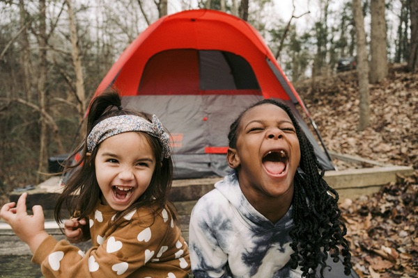 Family camping with pets at RV park